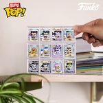 Funko Bitty POP! Disney - Mickey. 4-Pack - Mickey Mouse. Minnie Mouse (Pink Dress). Pluto and A Surprise Mystery Mini Figure - 0.9 Inch (2.2 Cm) Collectable - Stackable Display Shelf Included